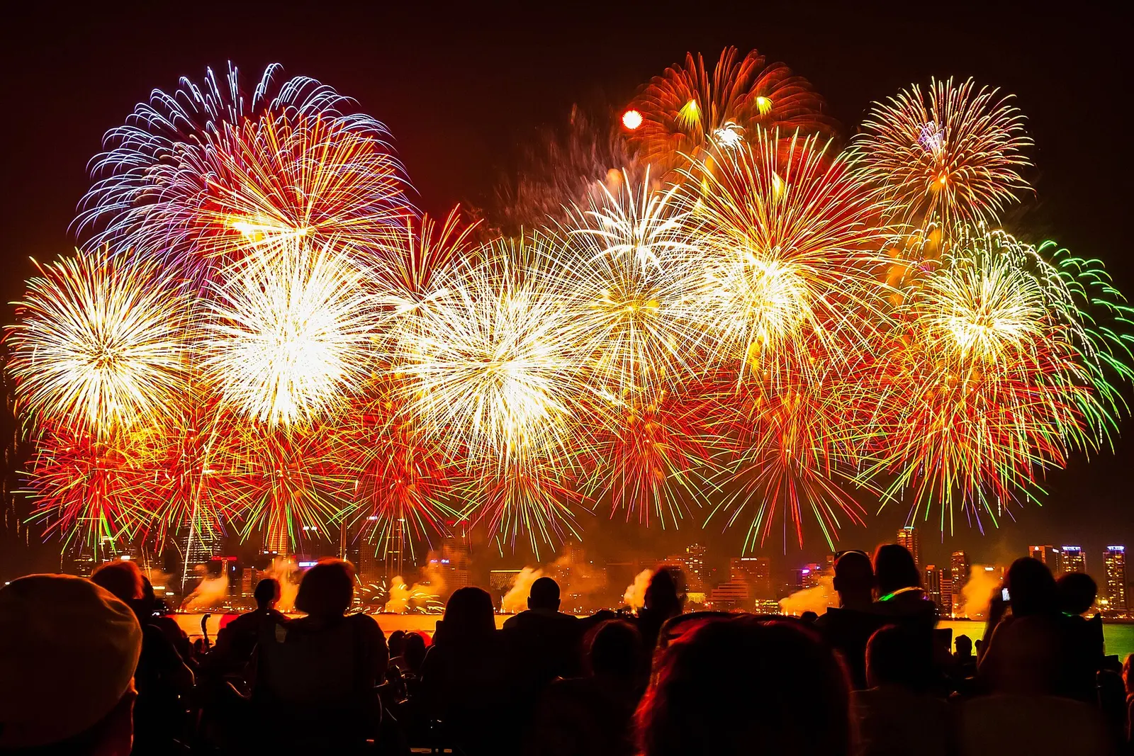 Crowds watching Australia Day fireworks over the water in Perth, 2013