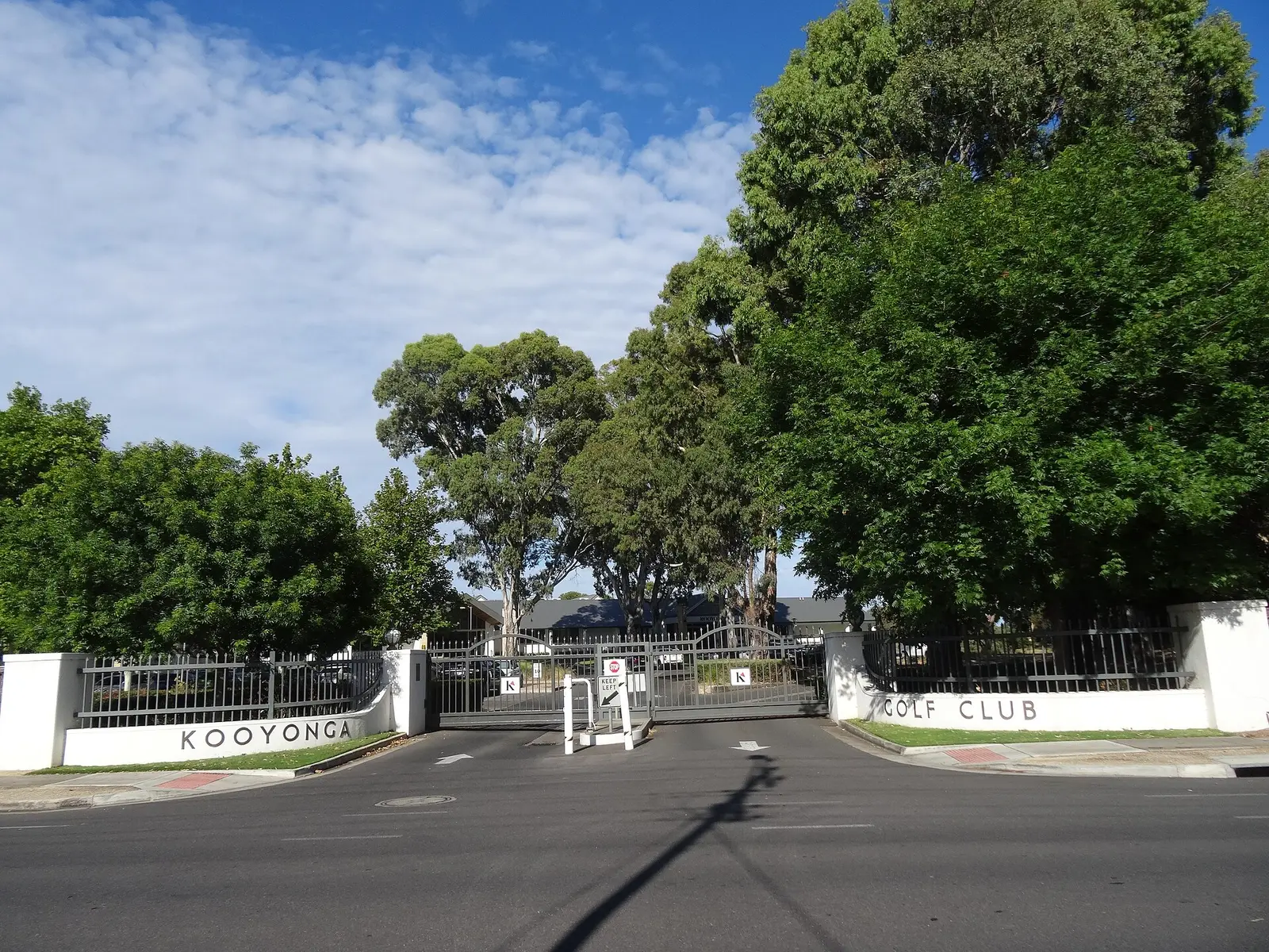 The entrance gate of Kooyonga Golf Club in Adelaide framed by trees